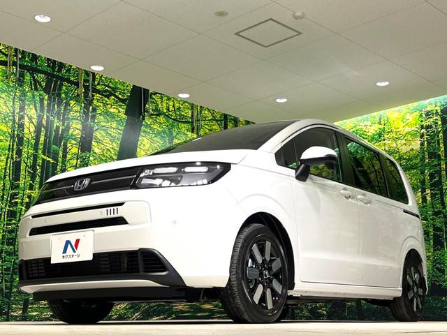 フリード e:HEVエアー EX 登録済未使用車 両側電動ドア 衝突被害軽減システム コーナーセンサー スマートキー LEDヘッド 純正15インチアルミ オートハイビーム 車線逸脱警報 オートライト オートエアコン(29枚目)