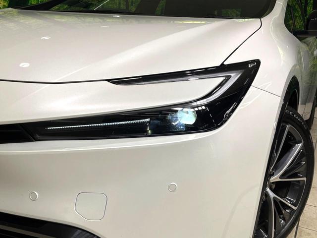 プリウス Z 禁煙車 純正12.3型ナビ 全周囲カメラ ブラインドスポットモニター 衝突軽減装置 レーダークルーズコントロール シートベンチレーション パワーバックドア ETC レザー調シート パワーシート(13枚目)