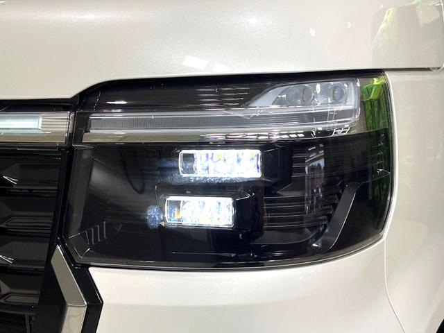 N-BOXカスタム ターボ 禁煙車 純正9型ナビ バックカメラ 衝突軽減装置 アダプティブクルコン パドルシフト シートヒーター シートバックテーブル ハーフレザー調シート 革巻きステアリング LEDヘッドライト(13枚目)