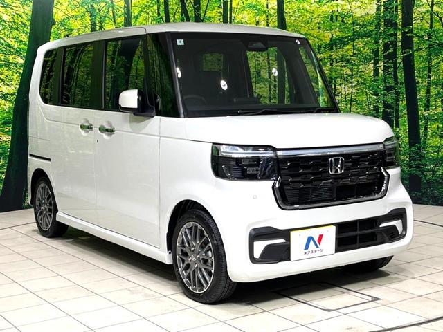 N-BOXカスタム ターボ 禁煙車 純正9型ナビ バックカメラ 衝突軽減装置 アダプティブクルコン パドルシフト シートヒーター シートバックテーブル ハーフレザー調シート 革巻きステアリング LEDヘッドライト(17枚目)