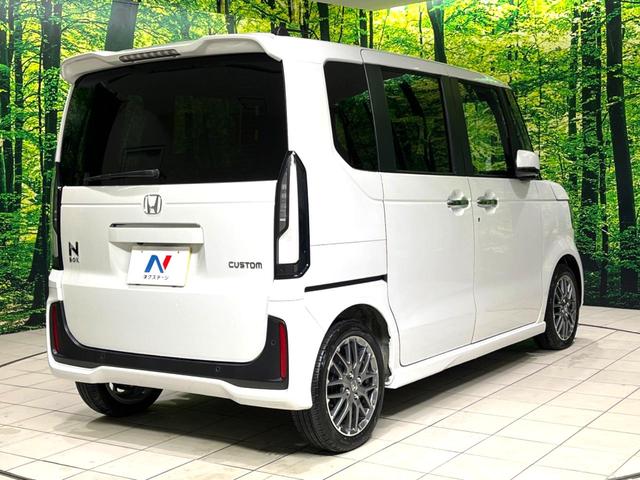 N-BOXカスタム ターボ 禁煙車 純正9型ナビ バックカメラ 衝突軽減装置 アダプティブクルコン パドルシフト シートヒーター シートバックテーブル ハーフレザー調シート 革巻きステアリング LEDヘッドライト(18枚目)