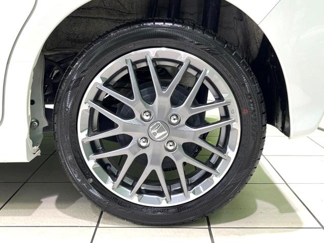 N-BOXカスタム ターボ 禁煙車 純正9型ナビ バックカメラ 衝突軽減装置 アダプティブクルコン パドルシフト シートヒーター シートバックテーブル ハーフレザー調シート 革巻きステアリング LEDヘッドライト(28枚目)