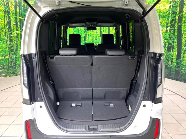 N-BOXカスタム ターボ 禁煙車 純正9型ナビ バックカメラ 衝突軽減装置 アダプティブクルコン パドルシフト シートヒーター シートバックテーブル ハーフレザー調シート 革巻きステアリング LEDヘッドライト(40枚目)
