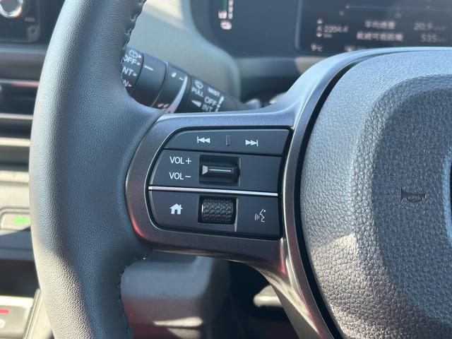 フリード ｅ：ＨＥＶクロスター　元試乗車／９インチ純正ナビ／両側電動スライドドア／純正ＥＴＣ／純正ドライブレコーダー／両席シートヒーター／スマートキー２個（15枚目）