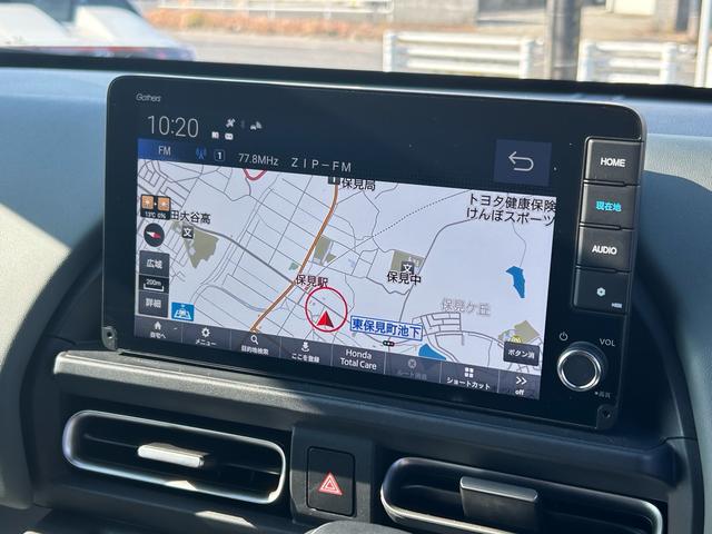 フリード ｅ：ＨＥＶクロスター　元試乗車／９インチ純正ナビ／両側電動スライドドア／純正ＥＴＣ／純正ドライブレコーダー／両席シートヒーター／スマートキー２個（18枚目）