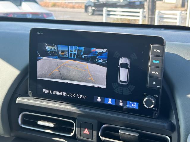 フリード ｅ：ＨＥＶクロスター　元試乗車／９インチ純正ナビ／両側電動スライドドア／純正ＥＴＣ／純正ドライブレコーダー／両席シートヒーター／スマートキー２個（20枚目）