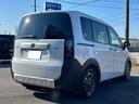 フリード ｅ：ＨＥＶクロスター　元試乗車／９インチ純正ナビ／両側電動スライドドア／純正ＥＴＣ／純正ドライブレコーダー／両席シートヒーター／スマートキー２個（6枚目）