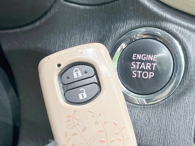 ヴィッツ Ｆ　シエル　禁煙車　純正ナビ　Ｂｌｕｅｔｏｏｔｈ再生　フルセグＴＶ　ＥＴＣ　スマートキー　オートライト　オートエアコン　ＤＶＤ再生　盗難防止装置　プライバシーガラス　ウィンカーミラー　シートリフター（7枚目）