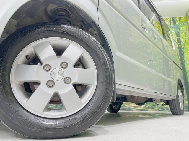 スクラムワゴン ＰＸターボ　ターボ　禁煙車　ナビ　ＨＩＤヘッドライト　ＥＴＣ　両側スライドドア　　純正１３インチアルミホイール　ＤＶＤ再生　ＣＤ再生　盗難防止装置　プライバシーガラス　ヘッドライトレベライザー（12枚目）
