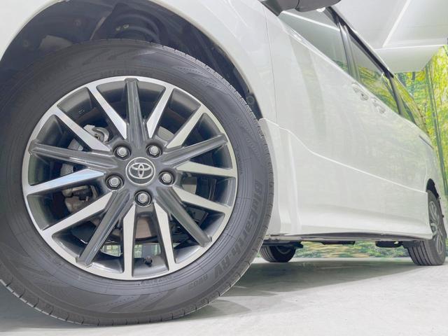 ノア Ｓｉ　両側電動スライドドア　純正ＳＤナビ　純正フリップダウンモニター　バックカメラ　禁煙車　ドラレコ　ＥＴＣ　オートライト　純正１６インチアルミ　Ｂｌｕｅｔｏｏｔｈ再生　ＣＤ　ＤＶＤ再生　フルセグ（14枚目）