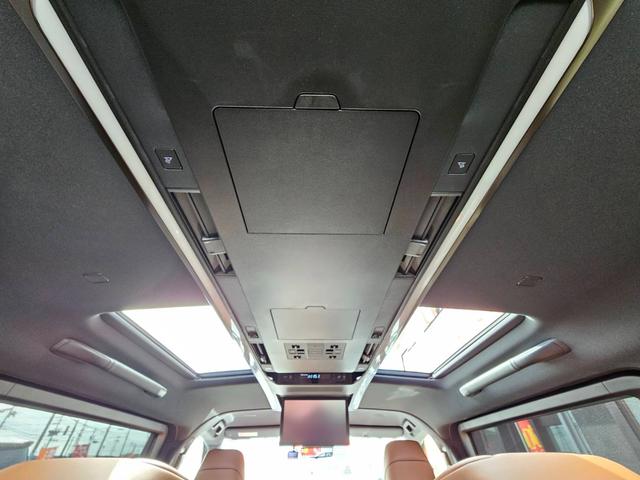 ヴェルファイアハイブリッド エグゼクティブラウンジ　１４型メーカーナビ　ＪＢＬ　１４型フリップダウンモニター　茶革シート　トヨタチームメイト　左右独立ムーンルーフ　デジタルインナーミラー　スペアタイヤ　スペアタイヤ　ドライブレコーダー前後　パワーシート（3枚目）