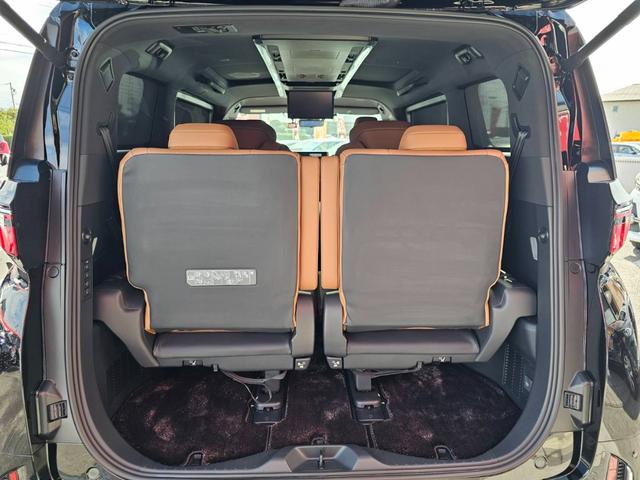 ヴェルファイアハイブリッド エグゼクティブラウンジ　１４型メーカーナビ　ＪＢＬ　１４型フリップダウンモニター　茶革シート　トヨタチームメイト　左右独立ムーンルーフ　デジタルインナーミラー　スペアタイヤ　スペアタイヤ　ドライブレコーダー前後　パワーシート（20枚目）