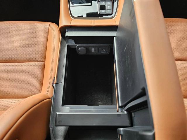 ヴェルファイアハイブリッド エグゼクティブラウンジ　１４型メーカーナビ　ＪＢＬ　１４型フリップダウンモニター　茶革シート　トヨタチームメイト　左右独立ムーンルーフ　デジタルインナーミラー　スペアタイヤ　スペアタイヤ　ドライブレコーダー前後　パワーシート（26枚目）