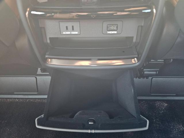 ヴェルファイアハイブリッド エグゼクティブラウンジ　１４型メーカーナビ　ＪＢＬ　１４型フリップダウンモニター　茶革シート　トヨタチームメイト　左右独立ムーンルーフ　デジタルインナーミラー　スペアタイヤ　スペアタイヤ　ドライブレコーダー前後　パワーシート（32枚目）