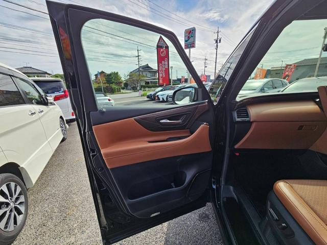 ヴェルファイアハイブリッド エグゼクティブラウンジ　１４型メーカーナビ　ＪＢＬ　１４型フリップダウンモニター　茶革シート　トヨタチームメイト　左右独立ムーンルーフ　デジタルインナーミラー　スペアタイヤ　スペアタイヤ　ドライブレコーダー前後　パワーシート（57枚目）