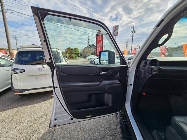 ランドクルーザー２５０ ＶＸ　ワンオーナー　禁煙車　トヨタチームメイト　丸目ヘッドライト　純正ナビ　全方位カメラ　デジタルインナーミラー　ムーンルーフ　ルーフレール　スペアタイヤ　黒革シート　スペアタイヤ　ビルトインＥＴＣ２．０（54枚目）