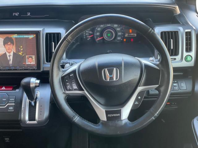 ステップワゴンスパーダ Z 両側パワースライドドア ナビ フルセグTV フリップダウンモニター バックカメラ ETC リアエアコン 8人乗り ステアリングスイッチ キーレスエントリー 助手席エアバッグ スペアキー(28枚目)