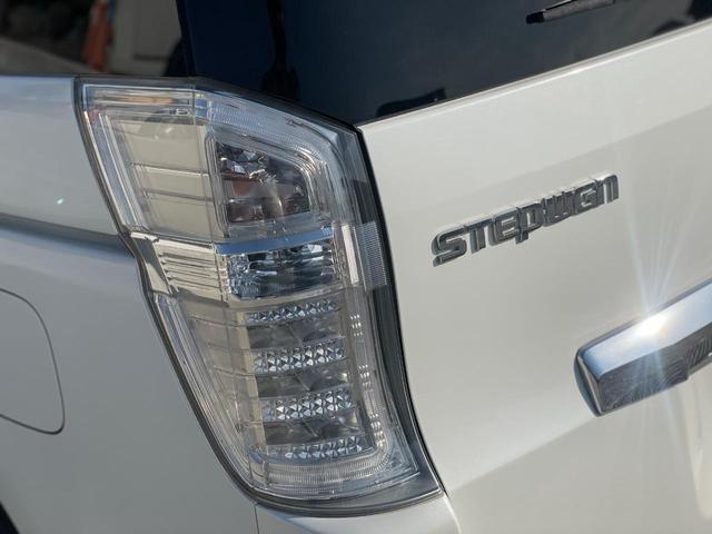 ステップワゴンスパーダ Z 両側パワースライドドア ナビ フルセグTV フリップダウンモニター バックカメラ ETC リアエアコン 8人乗り ステアリングスイッチ キーレスエントリー 助手席エアバッグ スペアキー(67枚目)