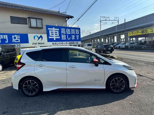 ノート ｅ－パワーニスモ　ドライブレコーダー　ＥＴＣ　全周囲カメラ　ナビ　ＴＶ　クリアランスソナー　レーンアシスト　衝突被害軽減システム　アルミホイール　オートライト　スマートキー　電動格納ミラー　ＣＶＴ　盗難防止システム（21枚目）