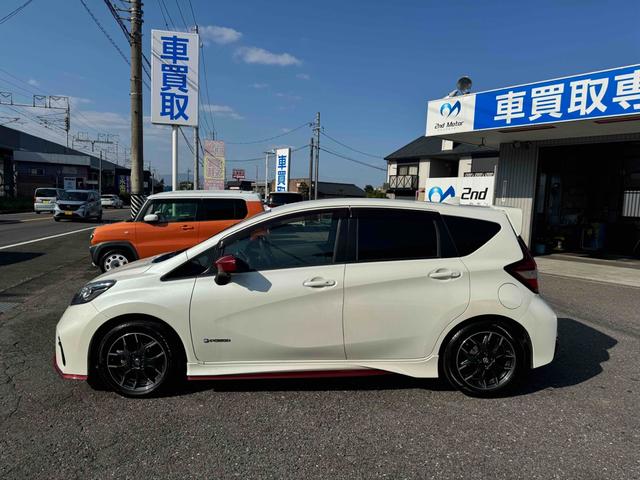 ノート ｅ－パワーニスモ　ドライブレコーダー　ＥＴＣ　全周囲カメラ　ナビ　ＴＶ　クリアランスソナー　レーンアシスト　衝突被害軽減システム　アルミホイール　オートライト　スマートキー　電動格納ミラー　ＣＶＴ　盗難防止システム（25枚目）