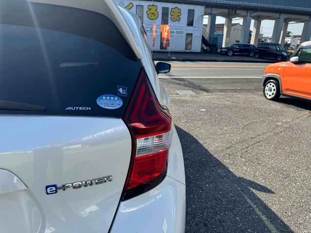 ノート ｅ－パワーニスモ　ドライブレコーダー　ＥＴＣ　全周囲カメラ　ナビ　ＴＶ　クリアランスソナー　レーンアシスト　衝突被害軽減システム　アルミホイール　オートライト　スマートキー　電動格納ミラー　ＣＶＴ　盗難防止システム（27枚目）