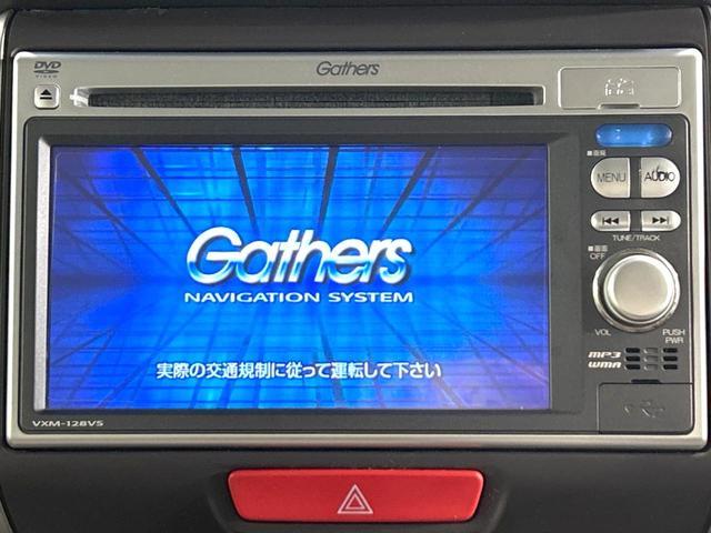 Ｇ・Ｌパッケージ　電動スライドドア　禁煙車　純正ナビ　ＥＴＣ　スマートキー　ステアリングスイッチ　ＣＤ　ＤＶＤ再生　地デジ　盗難防止装置　プライバシーガラス　アイドリングストップ(3枚目)