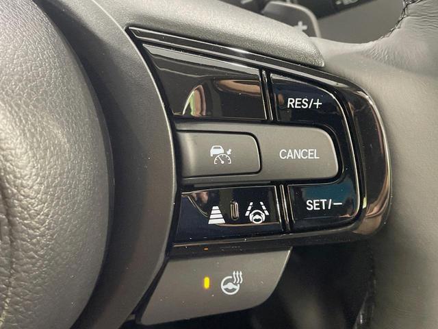 ヴェゼル ｅ：ＨＥＶ　Ｚ　登録済未使用車　純正９型ナビ　バックカメラ　ホンダセンシング　レーダークルーズ　電動リアゲート　コーナーセンサー　スマートキー　ＬＥＤヘッド　ＥＴＣ２．０　オートハイビーム　車線逸脱警報（5枚目）