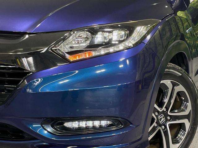 ヴェゼル ハイブリッドZ・ホンダセンシング 純正SDナビ バックカメラ 衝突被害軽減システム レーダークルーズ 禁煙車 スマートキー LEDヘッド ビルトインETC 車線逸脱警報 オートライト デュアルエアコン 寒冷地仕様(12枚目)