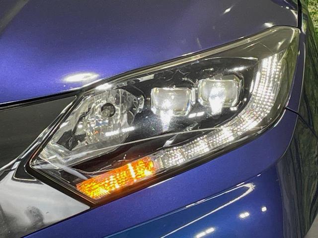 ヴェゼル ハイブリッドZ・ホンダセンシング 純正SDナビ バックカメラ 衝突被害軽減システム レーダークルーズ 禁煙車 スマートキー LEDヘッド ビルトインETC 車線逸脱警報 オートライト デュアルエアコン 寒冷地仕様(24枚目)