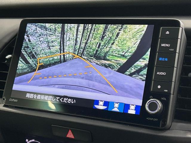 フィット e:HEVホーム 純正9インチナビ バックカメラ 衝突被害軽減システム レーダークルーズ 禁煙車 コーナーセンサー スマートキー LEDヘッド ETC オートハイビーム 車線逸脱警報 オートライト オートエアコン(4枚目)