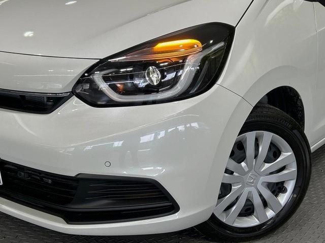 フィット e:HEVホーム 純正9インチナビ バックカメラ 衝突被害軽減システム レーダークルーズ 禁煙車 コーナーセンサー スマートキー LEDヘッド ETC オートハイビーム 車線逸脱警報 オートライト オートエアコン(12枚目)