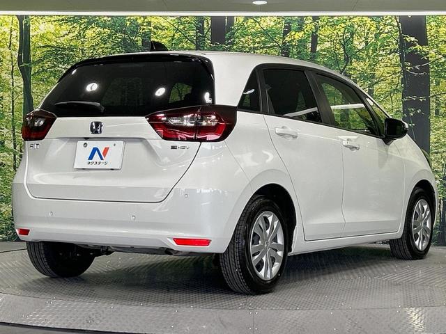 フィット e:HEVホーム 純正9インチナビ バックカメラ 衝突被害軽減システム レーダークルーズ 禁煙車 コーナーセンサー スマートキー LEDヘッド ETC オートハイビーム 車線逸脱警報 オートライト オートエアコン(17枚目)