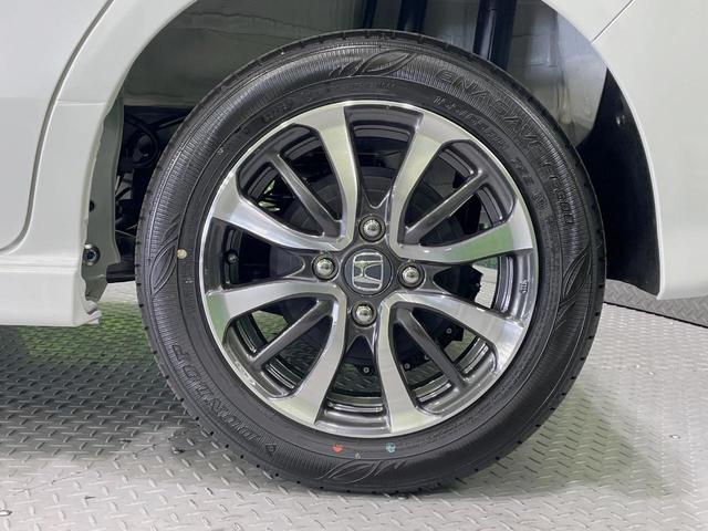 N-BOXカスタム ベースグレード 届出済未使用車 電動スライドドア バックカメラ 衝突被害軽減システム レーダークルーズ コーナーセンサー スマートキー LEDヘッド 純正14インチアルミ オートハイビーム 車線逸脱警報(52枚目)