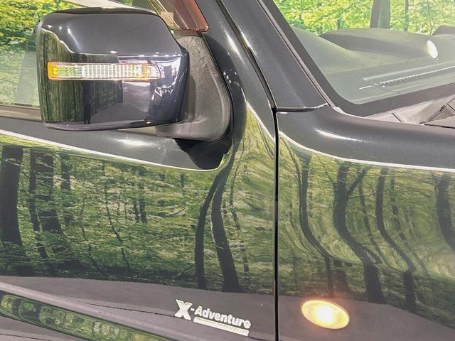ジムニー クロスアドベンチャー　４ＷＤ　ターボ　メモリーナビ　禁煙車　シートヒーター　ＥＴＣ　純正１６インチアルミ　ＣＤ　ＤＶＤ再生　フルセグ（30枚目）