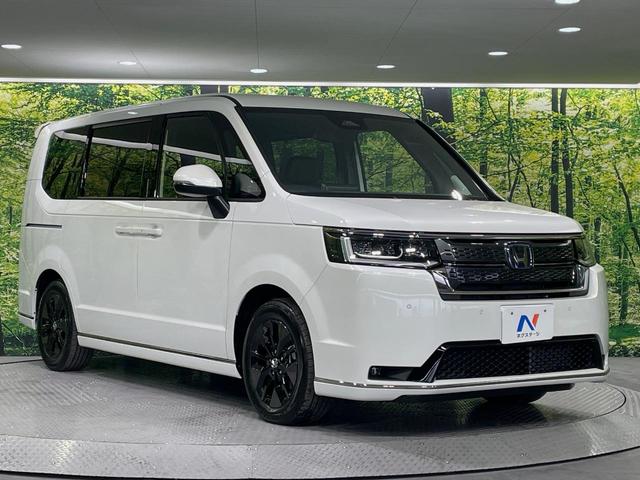 ステップワゴン ｅ：ＨＥＶスパーダ　登録済未使用車　両側電動ドア　純正１１．４インチナビ　バックカメラ　衝突被害軽減システム　レーダークルーズ　電動リアゲート　コーナーセンサー　スマートキー　ＬＥＤヘッド　純正１６インチアルミ（17枚目）