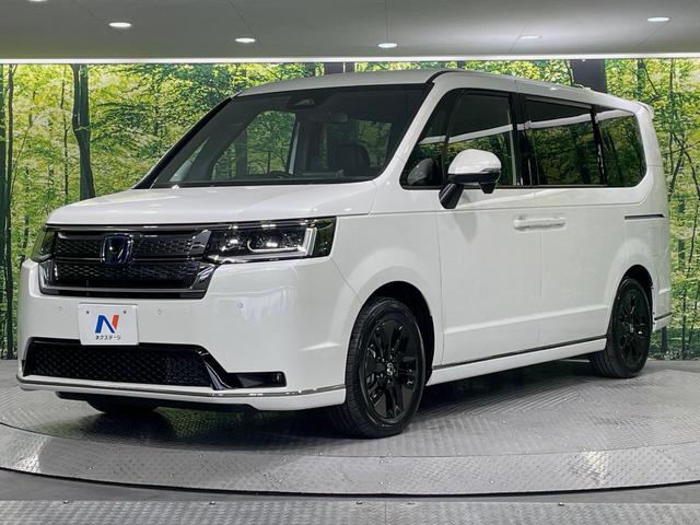 ステップワゴン ｅ：ＨＥＶスパーダ　登録済未使用車　両側電動ドア　純正１１．４インチナビ　バックカメラ　衝突被害軽減システム　レーダークルーズ　電動リアゲート　コーナーセンサー　スマートキー　ＬＥＤヘッド　純正１６インチアルミ（27枚目）