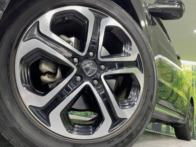 ヴェゼル ハイブリッドＺ・ホンダセンシング　純正ＳＤナビ　バックカメラ　寒冷地仕様　衝突被害軽減システム　ドラレコ　スマートキー　ＬＥＤヘッド　ルーフレール　ビルトインＥＴＣ　純正１７インチアルミ　車線逸脱警報　オートライト（2枚目）