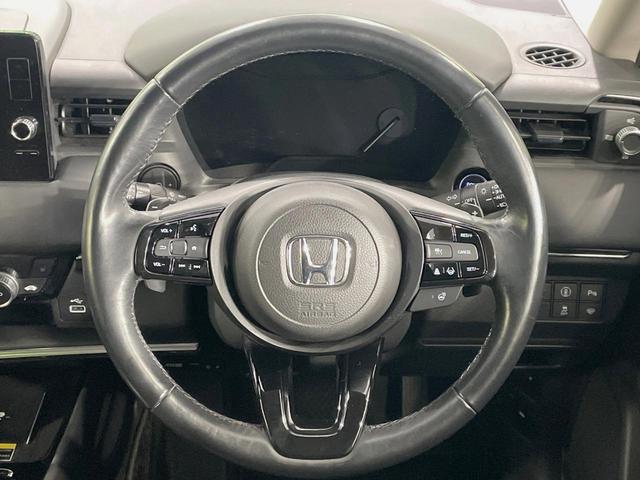 ヴェゼル ｅ：ＨＥＶ　Ｚ　純正９型ナビ　バックカメラ　寒冷地仕様　ホンダセンシング　電動リアゲート　ドラレコ　コーナーセンサー　スマートキー　ＬＥＤヘッド　ＥＴＣ２．０　純正１８インチアルミ　オートハイビーム（11枚目）