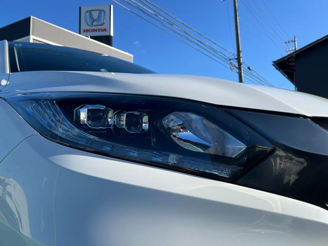 ヴェゼル ハイブリッドＸ　４ＷＤ　安心パッケージ　純正ナビ　ワンセグ　ブルートゥース　バックカメラ　ＬＥＤヘッドライト　クルコン　パドルシフト　スマートキー　純正アルミホイール（14枚目）