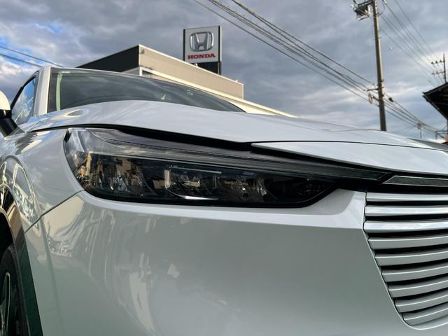 ヴェゼル ｅ：ＨＥＶＺ　４ＷＤ　ホンダセンシング　純正インターナビ　フルセグＴＶ　ブルートゥース　バックカメラ　ＥＴＣ　前後ドライブレコーダー　パワーテールゲート　ＬＥＤヘッドライト（15枚目）