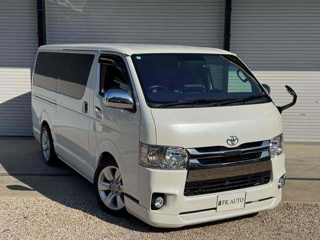 ハイエースバン スーパーＧＬ　ダークプライムＩＩ　ディーゼル　２ＷＤ　アルパインビックＸナビ　フリップダウン　シートカバー　ＵＩビークルスライドフロア　ショック　ベットキット　プラドホイール　公認ローダウン　ＣＲＳバンパー　リップ　ゴーストフィルム（2枚目）