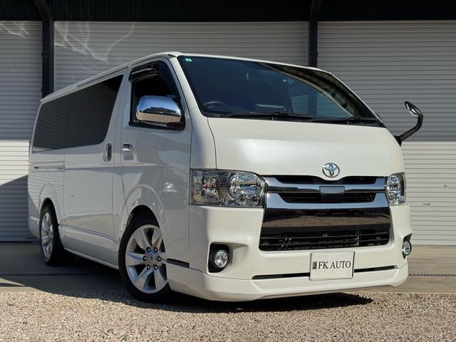 ハイエースバン スーパーＧＬ　ダークプライムＩＩ　ディーゼル　２ＷＤ　アルパインビックＸナビ　フリップダウン　シートカバー　ＵＩビークルスライドフロア　ショック　ベットキット　プラドホイール　公認ローダウン　ＣＲＳバンパー　リップ　ゴーストフィルム（7枚目）