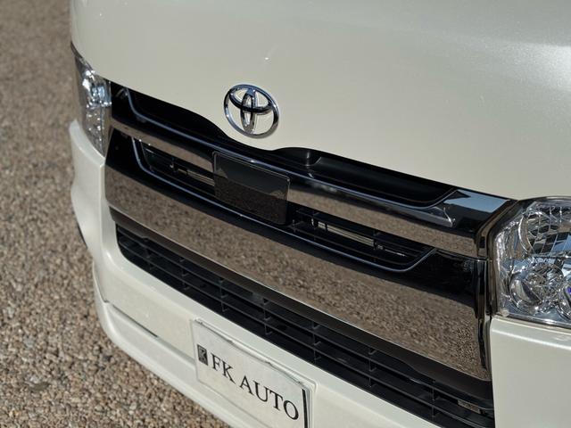ハイエースバン スーパーＧＬ　ダークプライムＩＩ　ディーゼル　２ＷＤ　アルパインビックＸナビ　フリップダウン　シートカバー　ＵＩビークルスライドフロア　ショック　ベットキット　プラドホイール　公認ローダウン　ＣＲＳバンパー　リップ　ゴーストフィルム（12枚目）