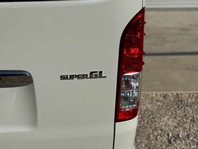 ハイエースバン スーパーＧＬ　ダークプライムＩＩ　ディーゼル　２ＷＤ　アルパインビックＸナビ　フリップダウン　シートカバー　ＵＩビークルスライドフロア　ショック　ベットキット　プラドホイール　公認ローダウン　ＣＲＳバンパー　リップ　ゴーストフィルム（37枚目）
