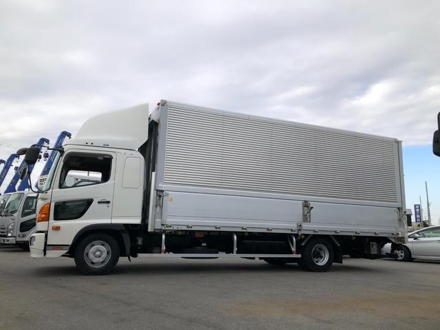 ヒノレンジャー 　ワイド　６２００ボディ　アルミウイング　跳ね上げパワーゲート　リアエアサス　トランテックス　６速マニュアル　積載２４００ｋｇ　ベッド付　バックモニター（5枚目）