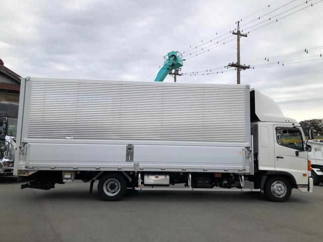 ヒノレンジャー 　ワイド　６２００ボディ　アルミウイング　跳ね上げパワーゲート　リアエアサス　トランテックス　６速マニュアル　積載２４００ｋｇ　ベッド付　バックモニター（8枚目）