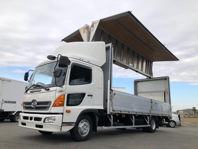 ヒノレンジャー 　ワイド　６２００ボディ　アルミウイング　跳ね上げパワーゲート　リアエアサス　トランテックス　６速マニュアル　積載２４００ｋｇ　ベッド付　バックモニター（10枚目）