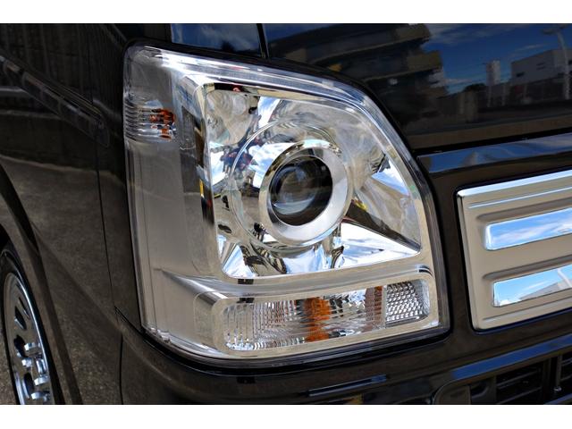 スーパーキャリイ Ｘ　届出済み未使用車　４ＷＤ　５ＭＴ　カスタム車輛　エスペリアローダウンキット　デイトナ１４インチメッキホイール　ＲＥＩＺテール　はろーすぺしゃるフロントスポイラー　マッドフラップ　イクリプスナビ（54枚目）