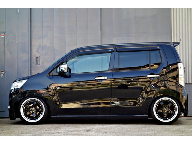 ワゴンＲスティングレー Ｔ　カスタム車輛　車高調　リアアクスル　ステルスレーシング１６ＡＷ　ｍｏｎｓｔｅｒＳＰＯＲＴマフラー　クラリオンナビ　Ｂｌｕｅｔｏｏｔｈ　バックカメラ　ドラレコ　シートカバー　サブウーハー　スマートキー（18枚目）