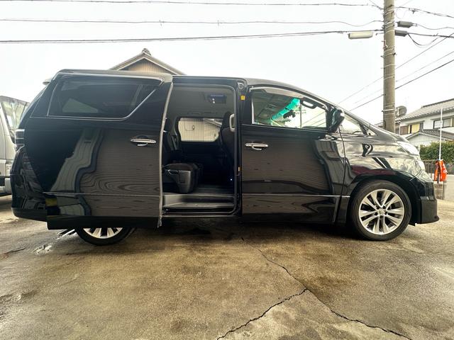 ヴェルファイア 2.4Z プラチナセレクションII 車検整備付き スマートキープッシュスタート リアエアコン 盗難防止システム 3列シート 衝突安全ボディ サイドエアバック 助手席エアバッグ パワーウィンドゥ パワーステアリング オットマン(13枚目)